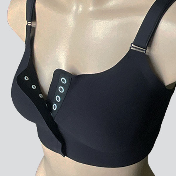 Close-up perspective view of the Amoena Jackie front fastening padded wireless bra front fastener press-stud closures.